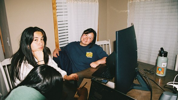 Students working together at a desk