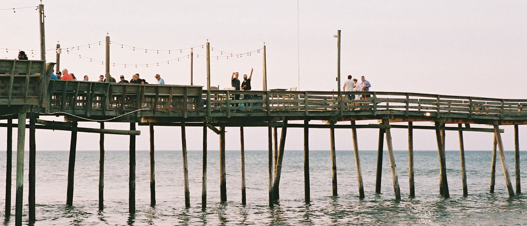 Wooden pier extending over the ocean
