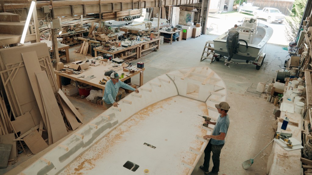 In his workshop, Patrick Harrison works on up to six projects at a time. Campbell Crisler (bottom left) and his son, Burcham Harrison (not pictured), help him complete ongoing projects.