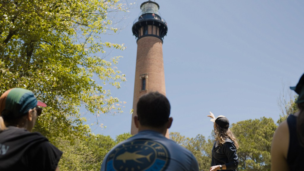 Meghan Agresto educates visiting UNCW students about the history of the Currituck Lighthouse.